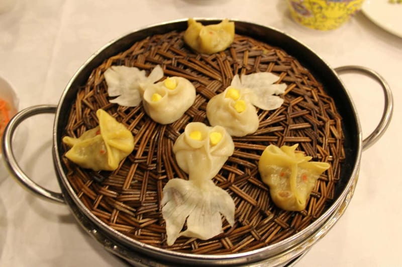 Cena china con espectáculo folclórico en Xián